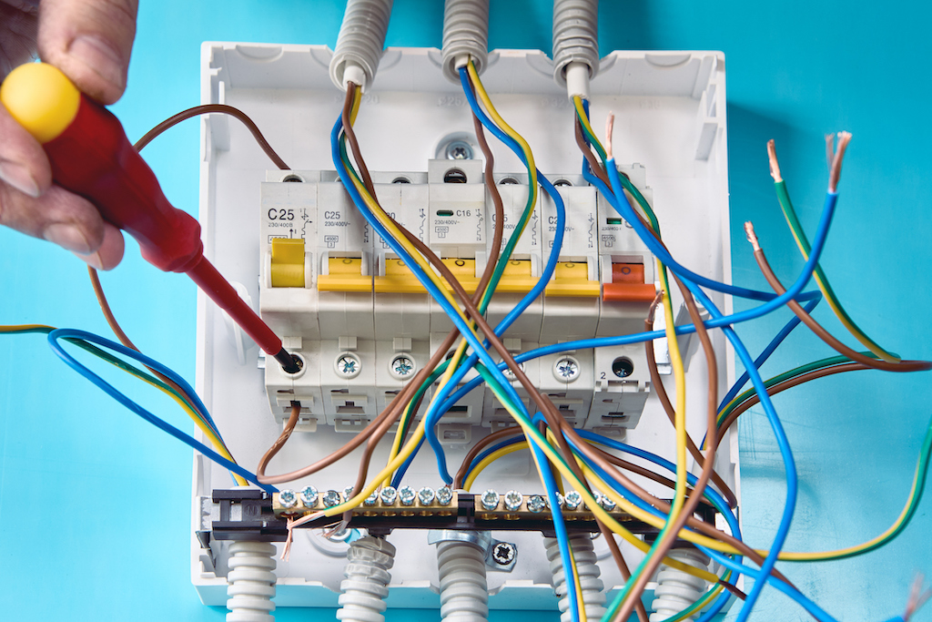 Installing of circuit breakers in switchboard of consumer unit.panel emergency electrical service