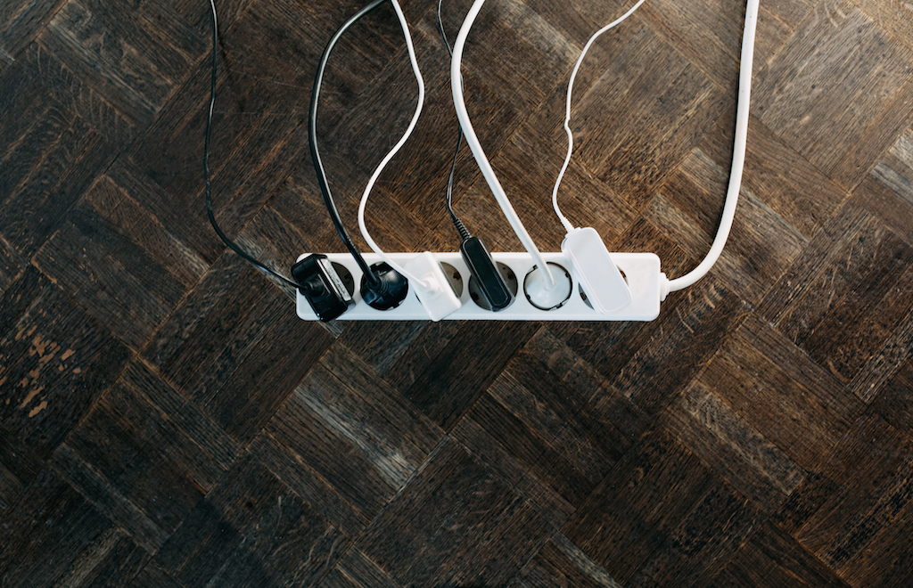 Too many chargers plugged in could cause electrical issues, in need of a general electrician.