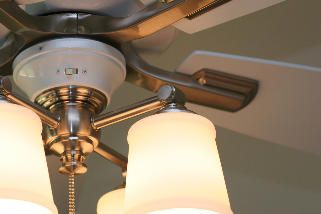 Close up shot of a ceiling fan. 